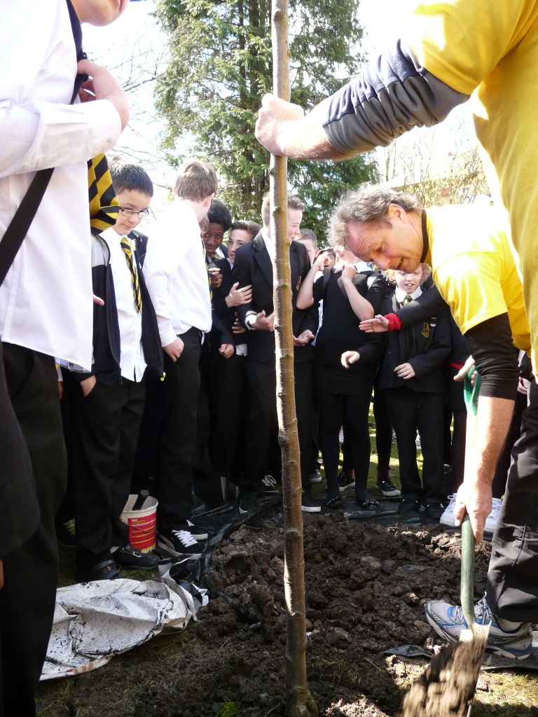 Planting with school children during the 2013 Ride for Research event at Glasgow